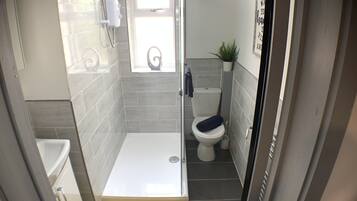Comfort Apartment, 1 Queen Bed with Sofa bed, Patio | Bathroom | Shower, rainfall showerhead, free toiletries, hair dryer