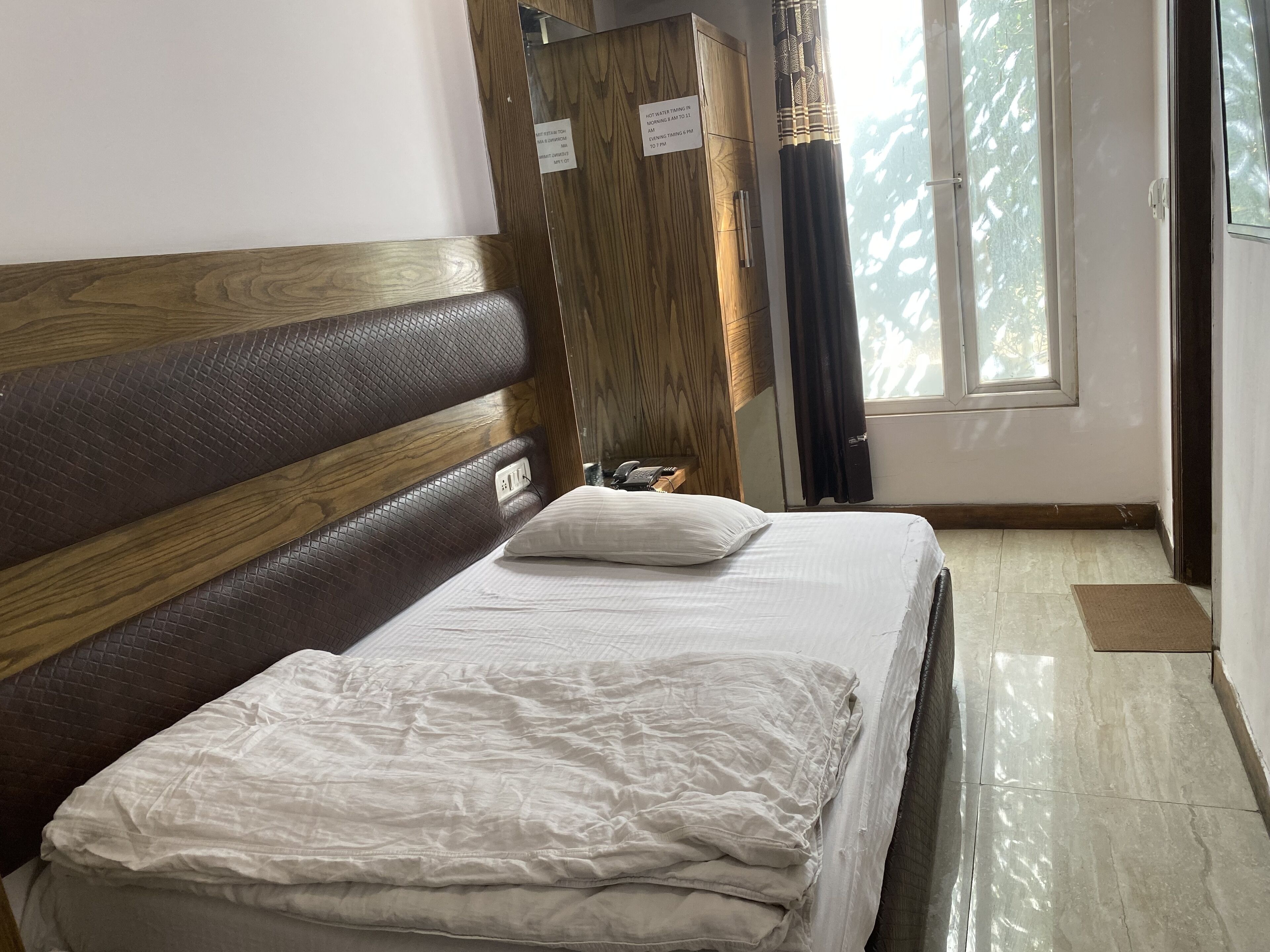 Foto - Hotel Ambience Just Near New Delhi Railway Station And Connaught Place