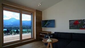 Apartemen Deluks, 3 kamar tidur (Penthouse) | Area keluarga | TV layar datar dan meja tenis meja