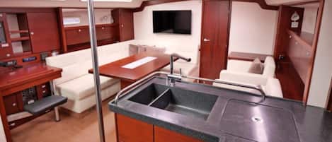 Flat-screen TV, first-run movies, pay movies, stereo