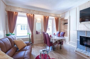 Apartment | Wohnzimmer | 30-Zoll-Fernseher mit Digitalempfang