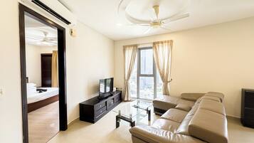 Comfort Apartment, 1 King Bed, Non Smoking, City View | Living area | 40-inch flat-screen TV with digital channels, TV