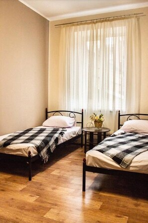 Shared Dormitory, Mixed Dorm (Bed in 4-Bed Dormitory) | 1 bedroom, iron/ironing board, free WiFi, bed sheets - Hostel Koleso (Odesa)