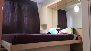 Premium bedding, blackout curtains, iron/ironing board, cots/infant beds