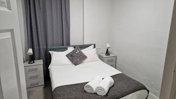 Apartemen | 3 kamar tidur, setrika/meja setrika, Wi-Fi gratis, dan seprai linen