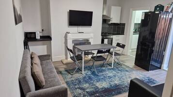 Apartment | Living area | 30-inch flat-screen TV with digital channels, TV