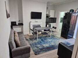 Apartment | Living area | 30-inch flat-screen TV with digital channels, TV