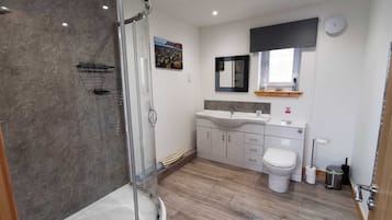 Cottage, 1 Bedroom | Bathroom | Shower, hair dryer, towels