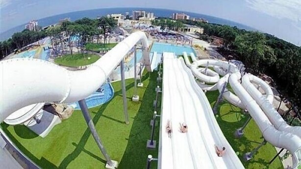 A water park with multiple water slides and a pool area. - Beautiful villa, stunning views, great location (Kranevo)