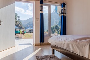 Deluxe Room, 1 Double Bed | Free WiFi, bed sheets - Blossom Bliss Resort (Dhari)