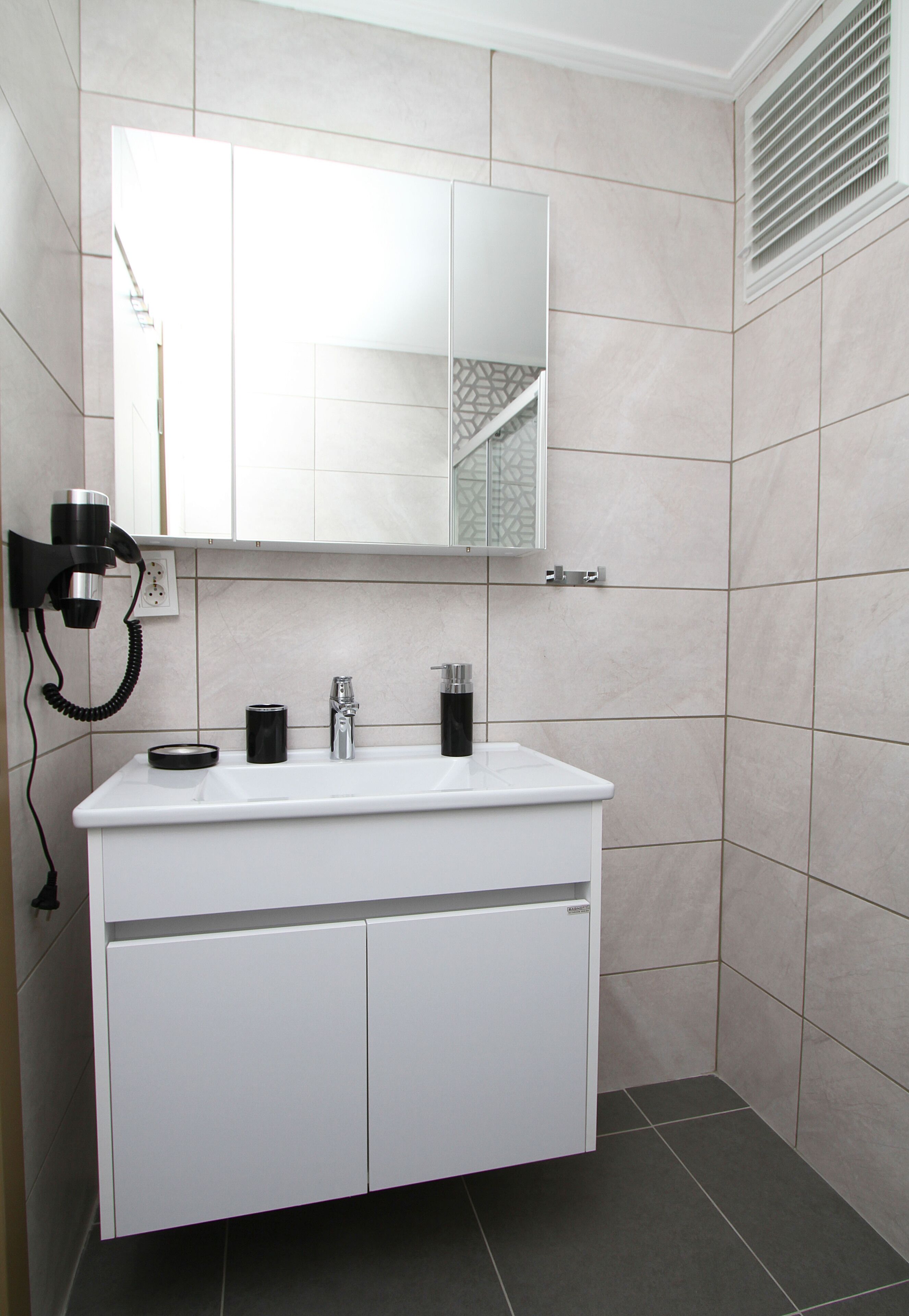 romantic apartment, 1 double bed with sofa bed, sea view | bathroom | shower, rainfall showerhead, hair dryer, slippers