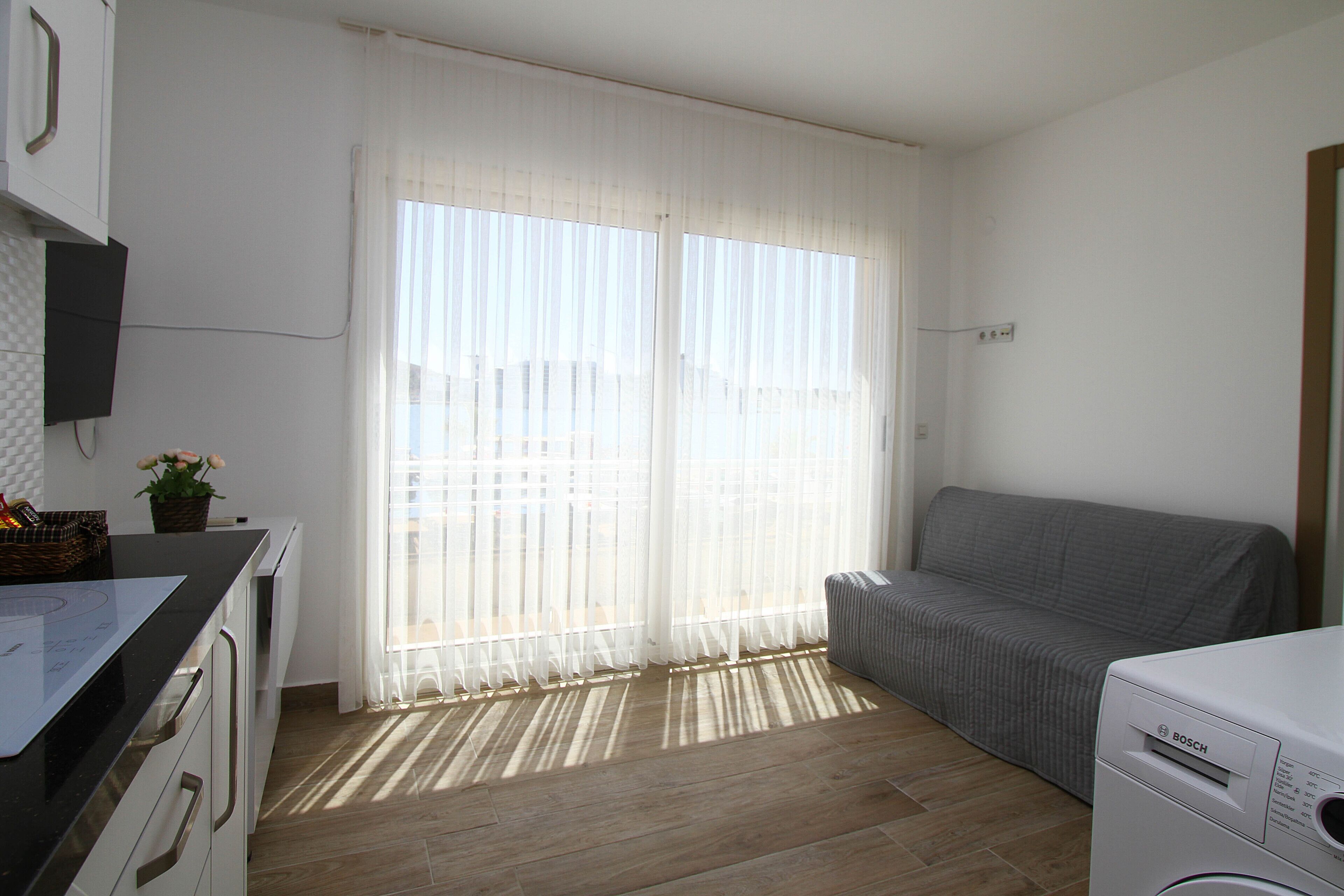 classic apartment, 1 double bed with sofa bed, sea view | living area | 43-inch smart tv with satellite channels, tv