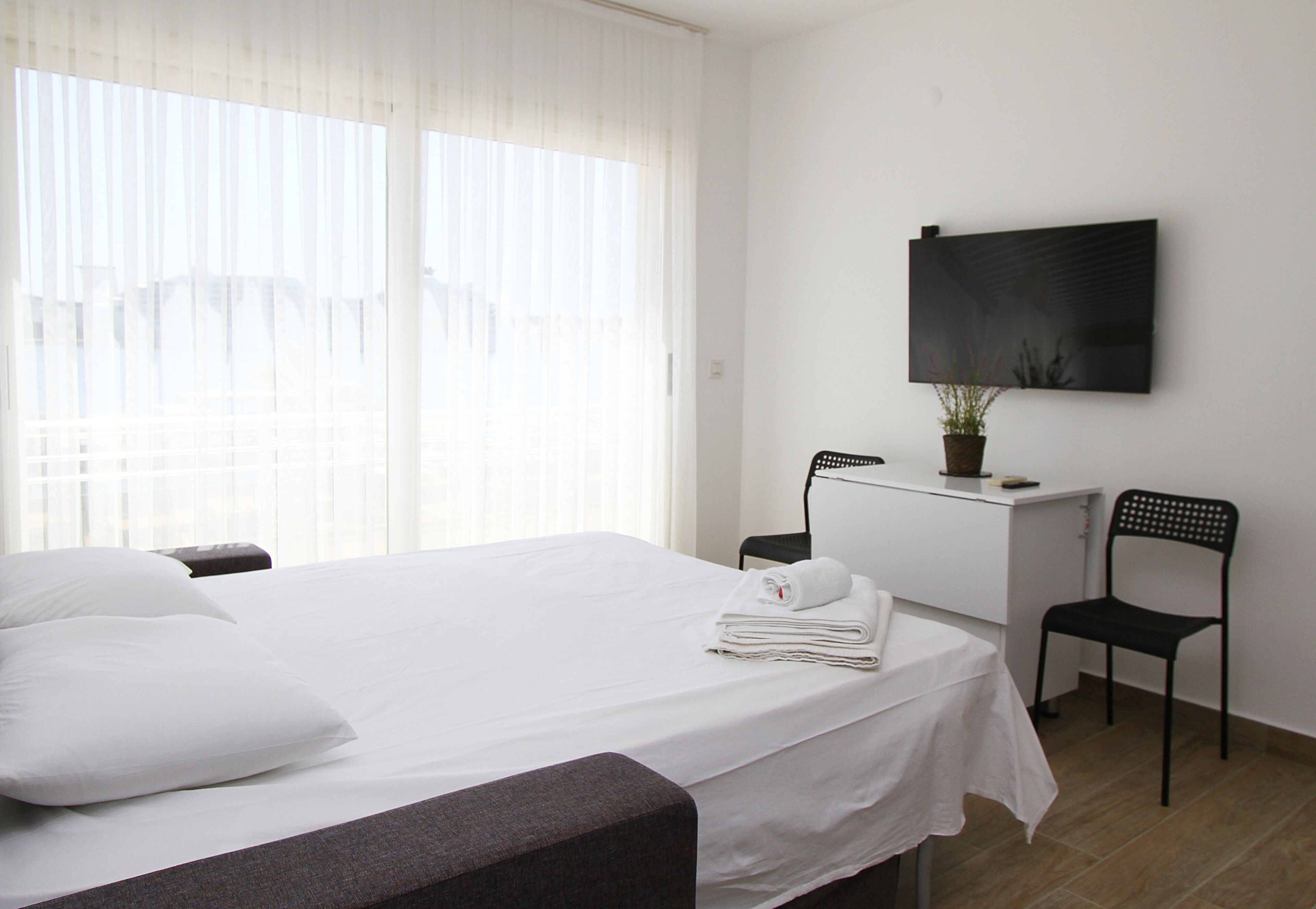 romantic apartment, 1 double bed with sofa bed, sea view | living area | 43-inch smart tv with satellite channels, tv