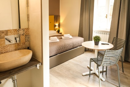 Standard Room, City View | Desk, blackout drapes, cribs/infant beds, free WiFi