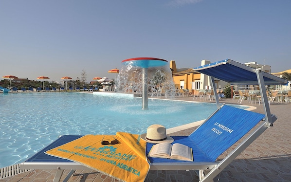Outdoor pool, pool umbrellas, sun loungers