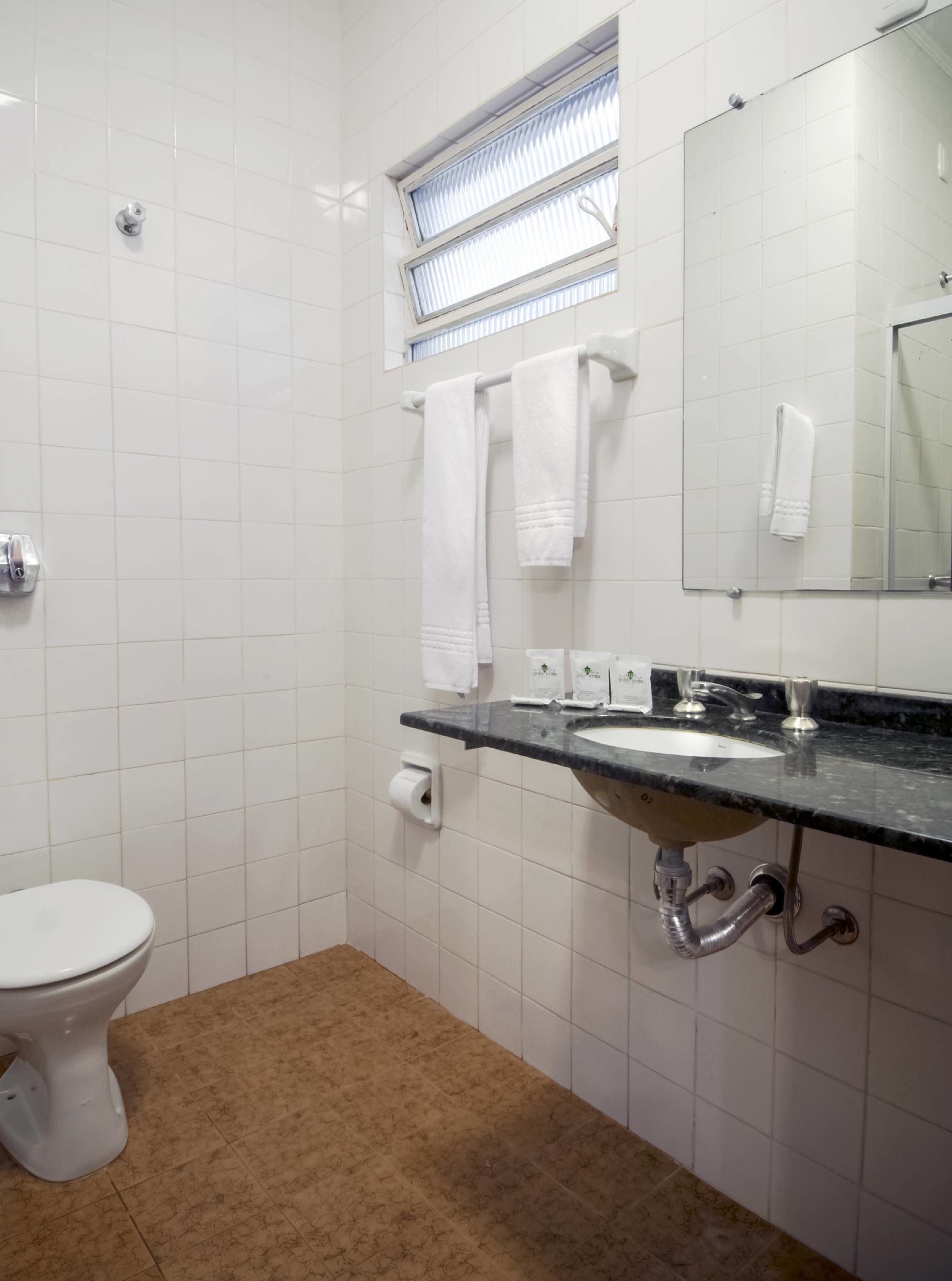 traditional room | bathroom | shower, hair dryer, towels, soap