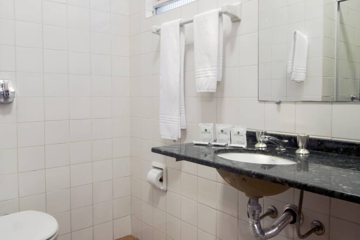 traditional room | bathroom | shower, hair dryer, towels, soap
