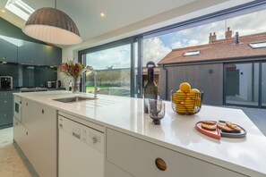 Microwave, dishwasher, coffee/tea maker, highchair