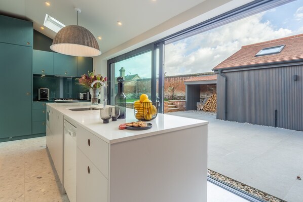 Microwave, dishwasher, coffee/tea maker, highchair