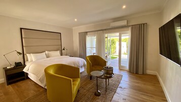 Junior Suite, Garden View | Premium bedding, down comforters, pillowtop beds, minibar