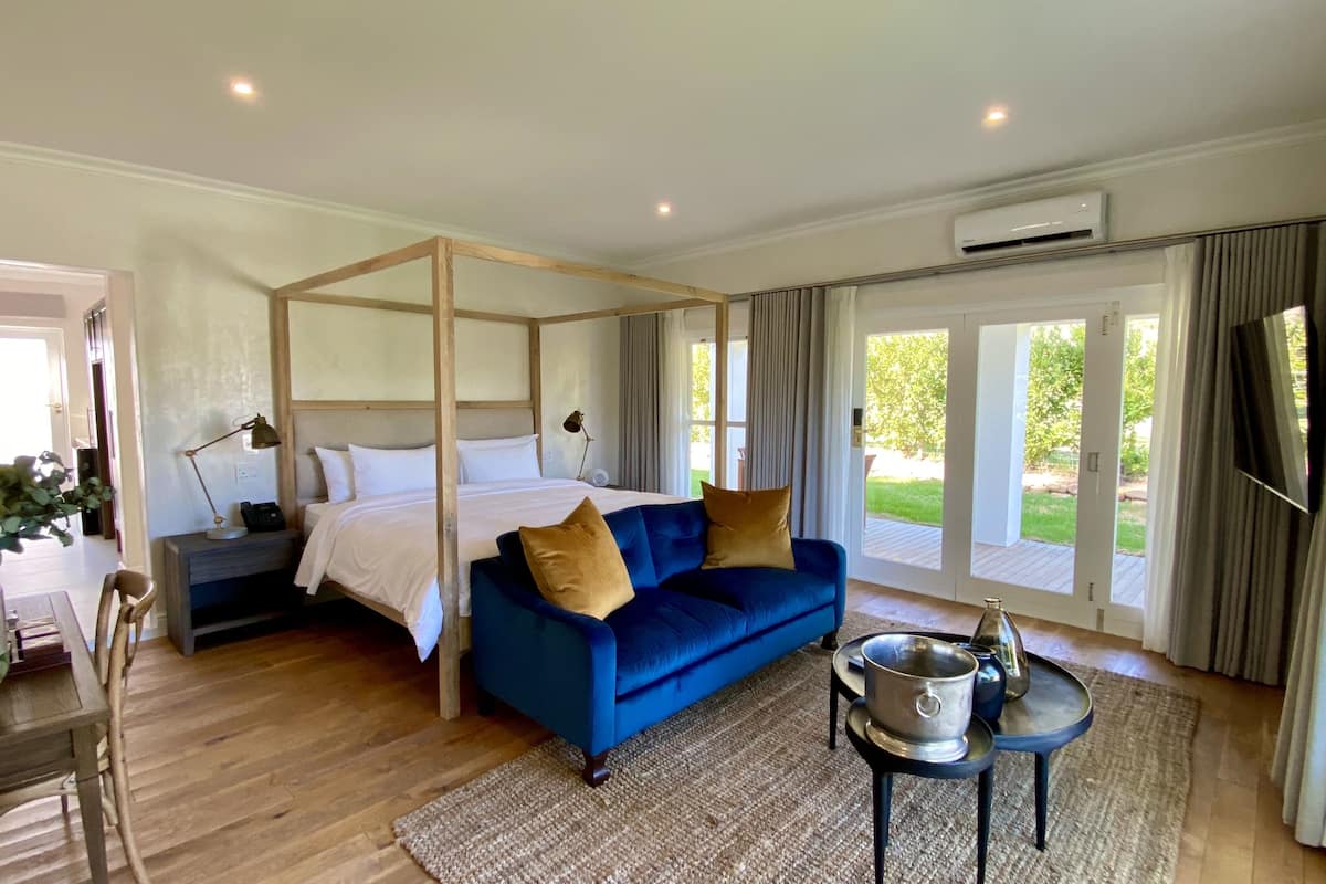 Deluxe suite, uitzicht op tuin | 1 slaapkamer, luxe beddengoed, donzen dekbedden, pillowtop-bedden