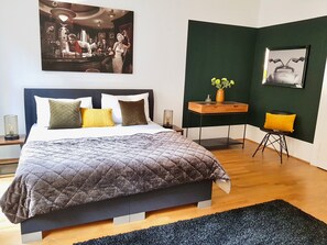 Desk, iron/ironing board, free cribs/infant beds, travel crib