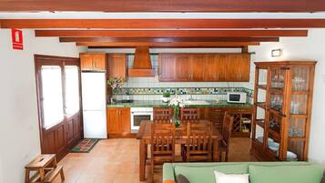 House, Multiple Beds, Garden View | Private kitchen | Full-size fridge, microwave, stovetop, cookware/dishes/utensils