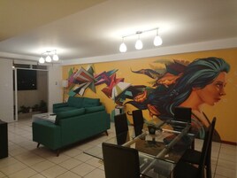 Exclusive Apartment, Park View | Living area | 49-inch Smart TV with cable channels, TV, video-game console