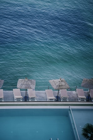 Seasonal outdoor pool, pool umbrellas