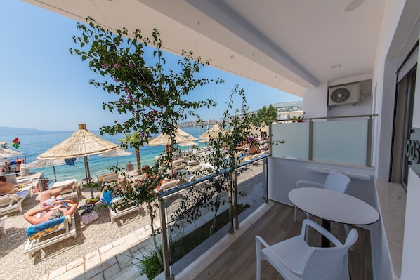 Standard Double or Twin Room, Pool View, Beachfront | Balcony view