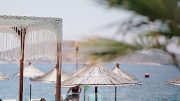 Seasonal outdoor pool, pool umbrellas
