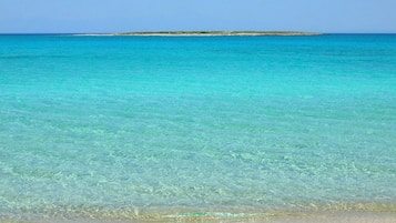 On the beach, sun loungers