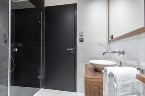 Apartment, Multiple Beds (Na Belidle 23 #1) | Bathroom | Hair dryer, towels, soap, shampoo - Modern Design near Andel by easyBNB (Prague)