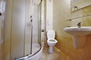 Shower, towels, soap, toilet paper