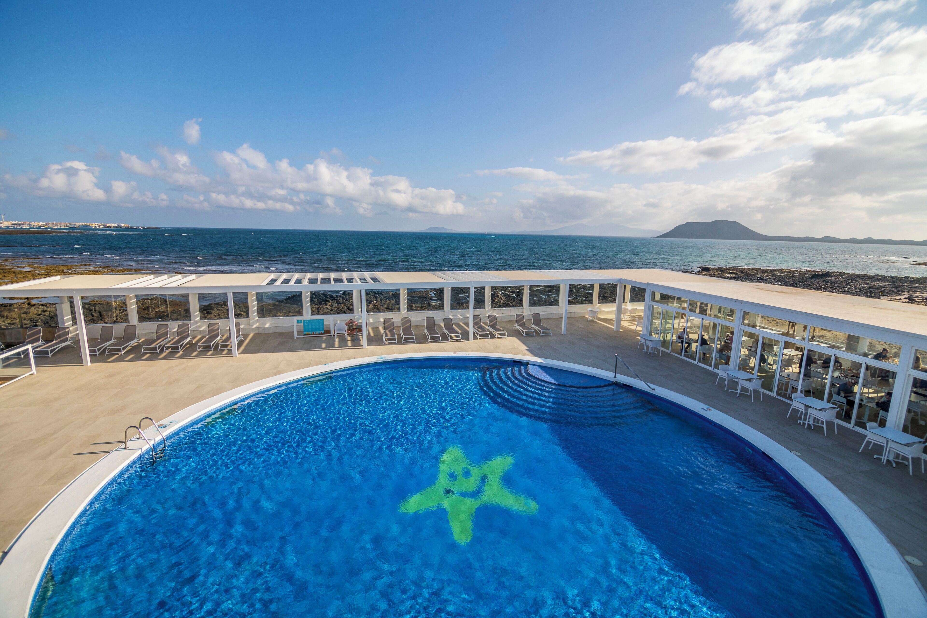 2 outdoor pools, pool umbrellas, sun loungers