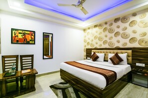 Economy Room, 1 King Bed | Living room | Flat-screen TV - Hotel Pearl Mahipalpur Delhi Airport (New Delhi)