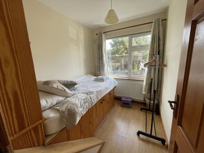 3 bedrooms, desk, iron/ironing board, travel cot