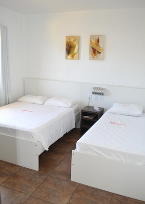 Frigobar, cortinas blackout, Wi-Fi de cortesia, roupa de cama