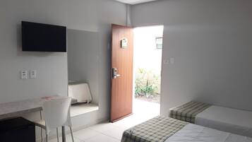 Deluxe Room, 3 Single Beds | Minibar, desk, laptop workspace, blackout curtains
