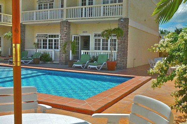 Poolside table awaits you.