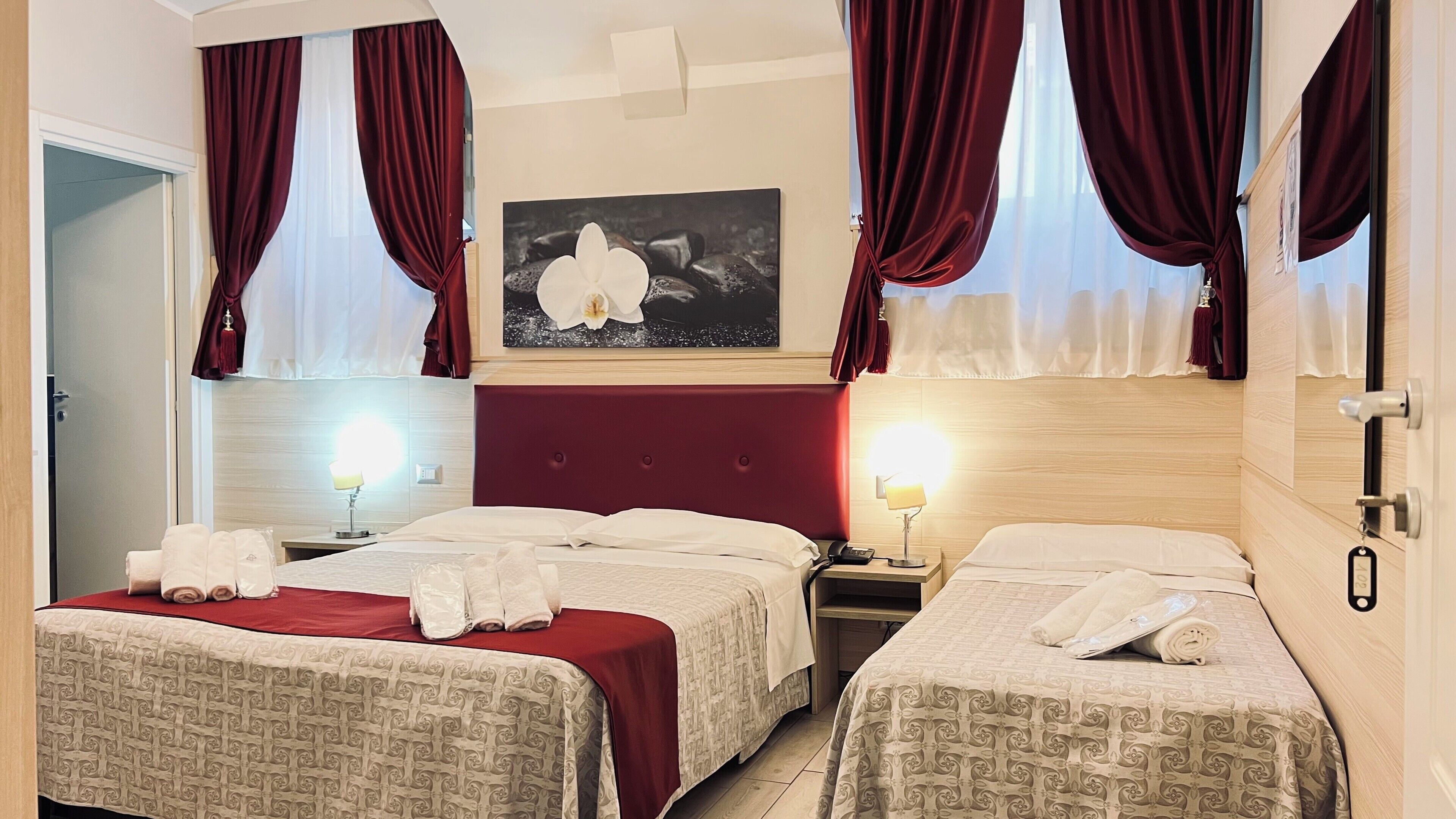 Classic Triple Room | Down comforters, in-room safe, desk, blackout drapes