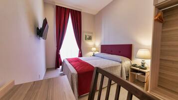 Classic Double or Twin Room | Down comforters, in-room safe, desk, blackout drapes