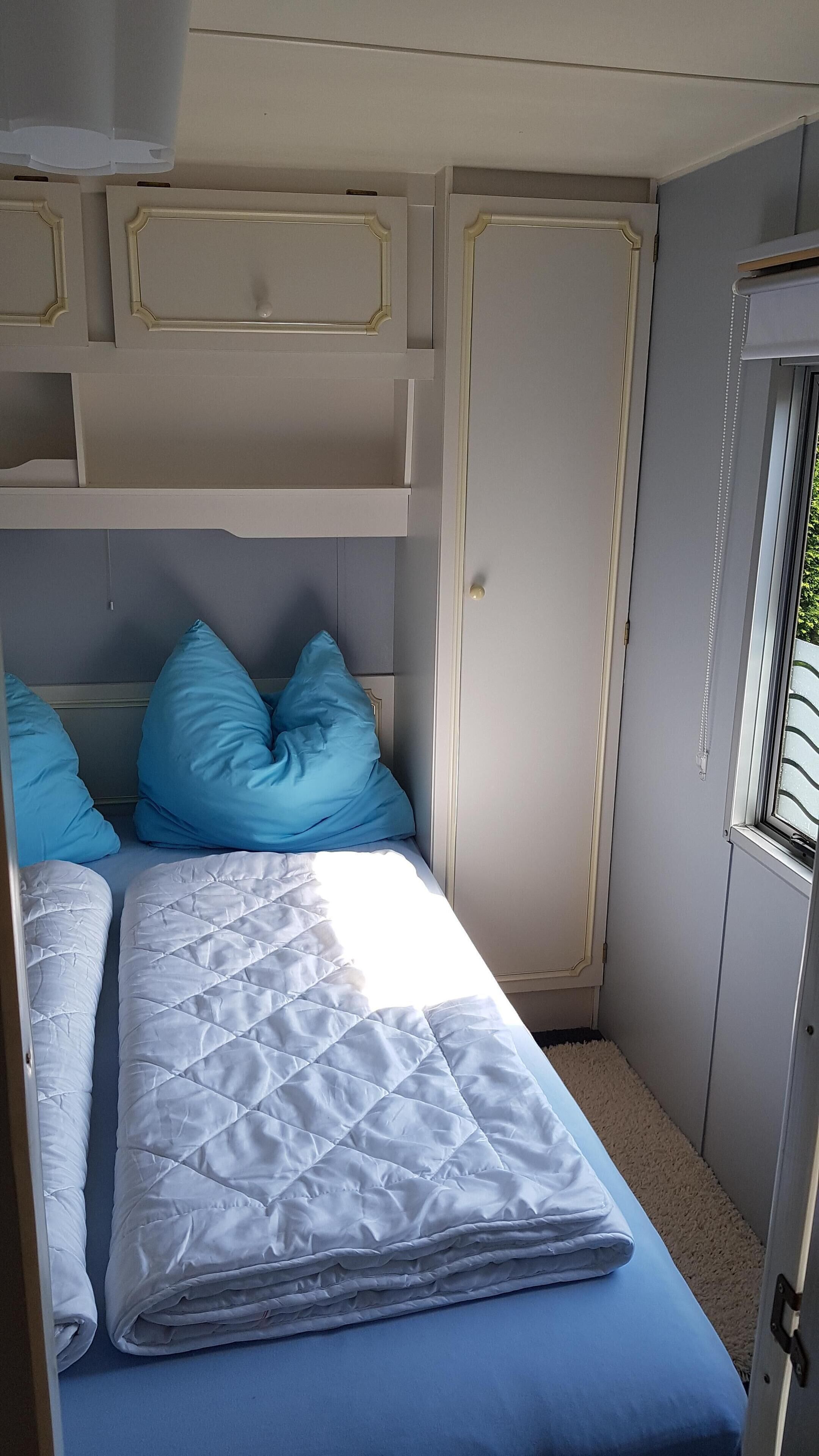 1 slaapkamer, een strijkplank/strijkijzer, reisbedje, gratis wifi