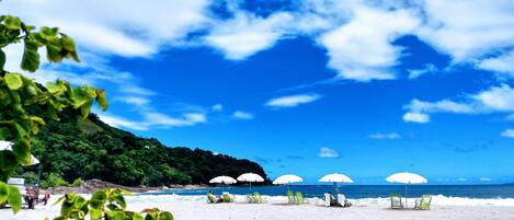 On the beach, sun loungers