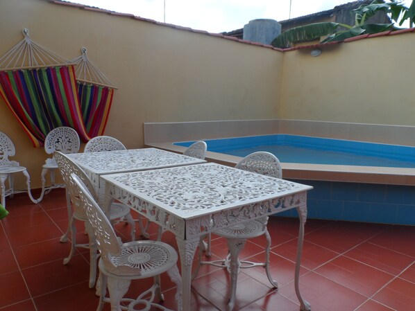 Outdoor pool, pool umbrellas, pool loungers