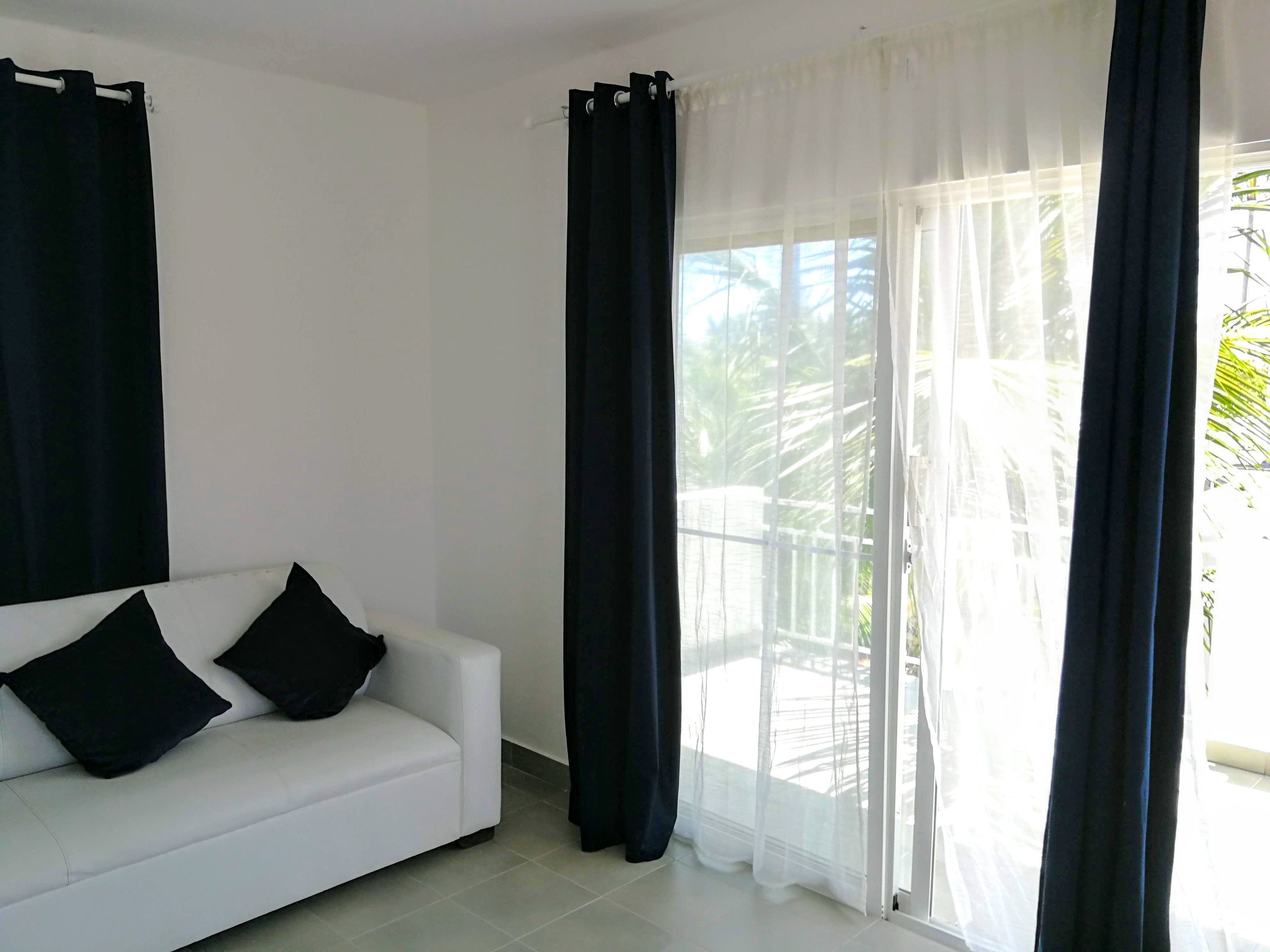 executive penthouse | living room | flat-screen tv