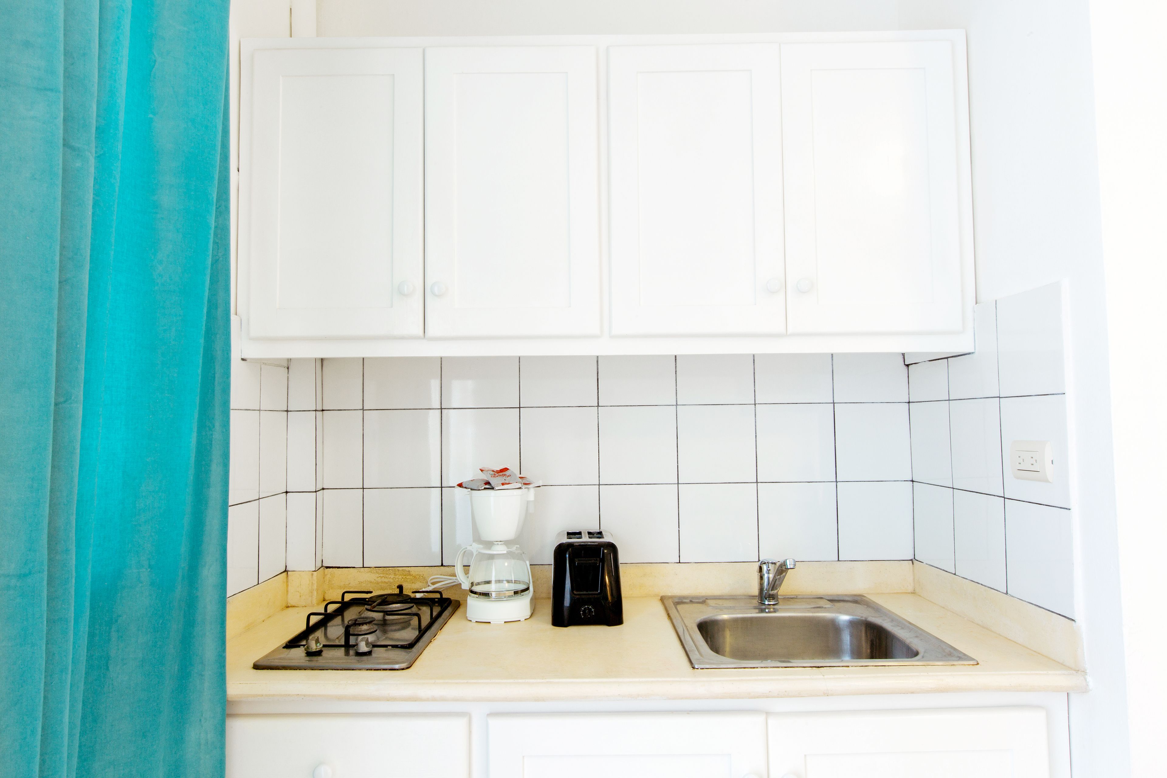 fridge, microwave, stovetop, coffee/tea maker