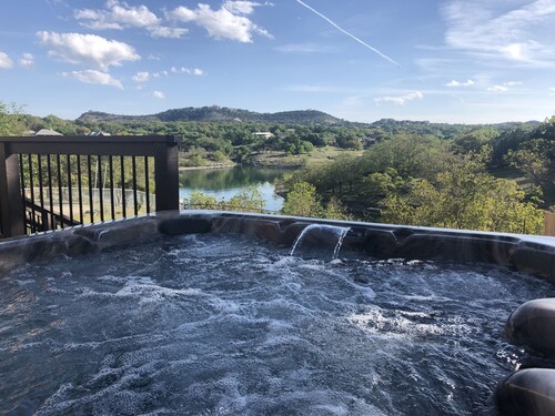 Fun family getaway!  Walk to the lake!  Hot tub, cocktail pool and views!