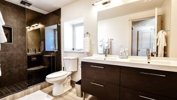 Combined shower/tub, hair dryer, towels, soap