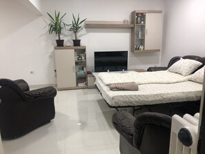 Comfort-huoneisto, useita sänkyjä | Oleskelualue